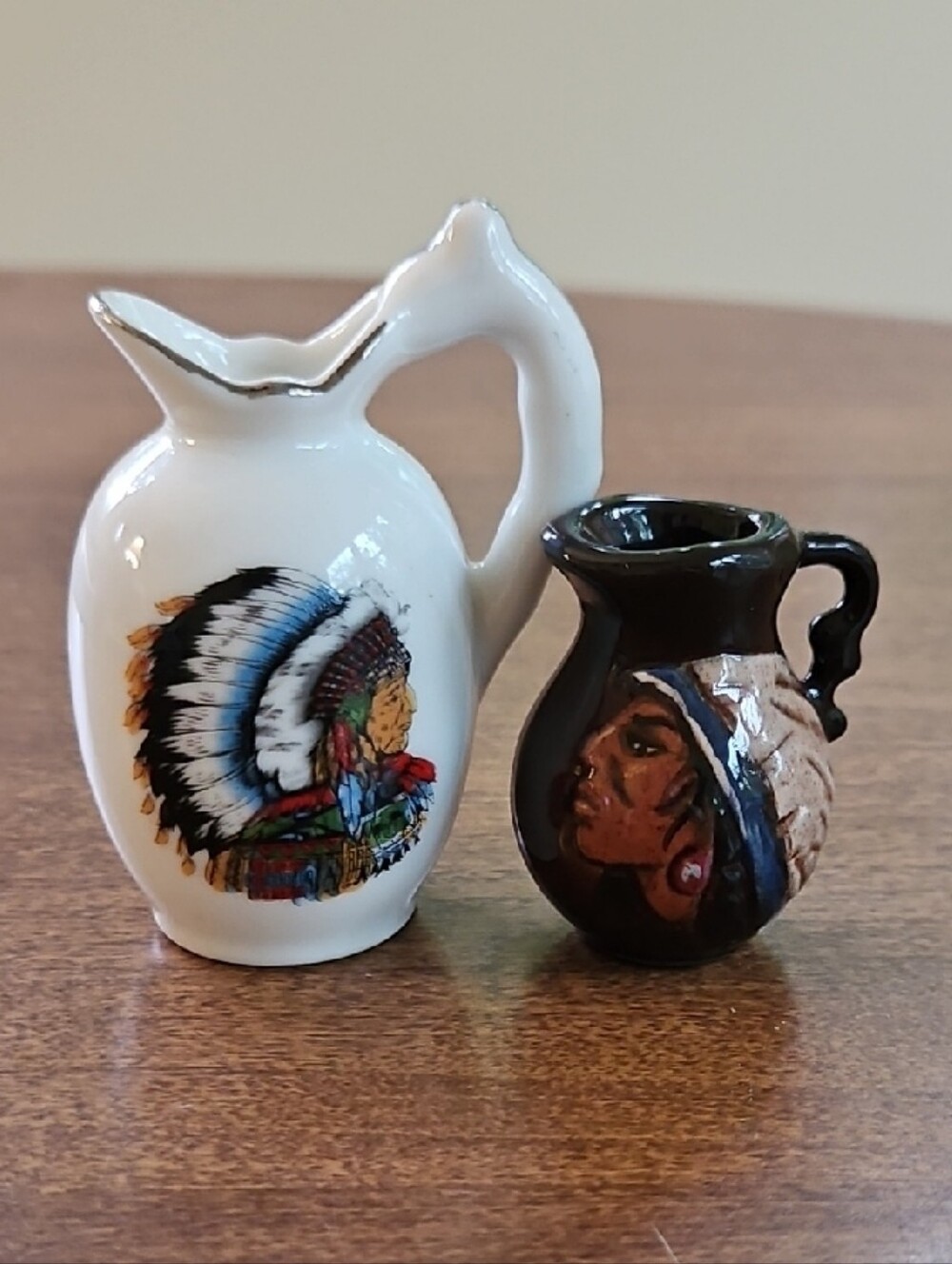 Two Miniature Native American Motif Pitchers - Picture 1 of 5
